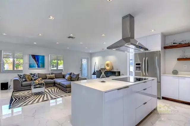 a view of a dining room with furniture and a table