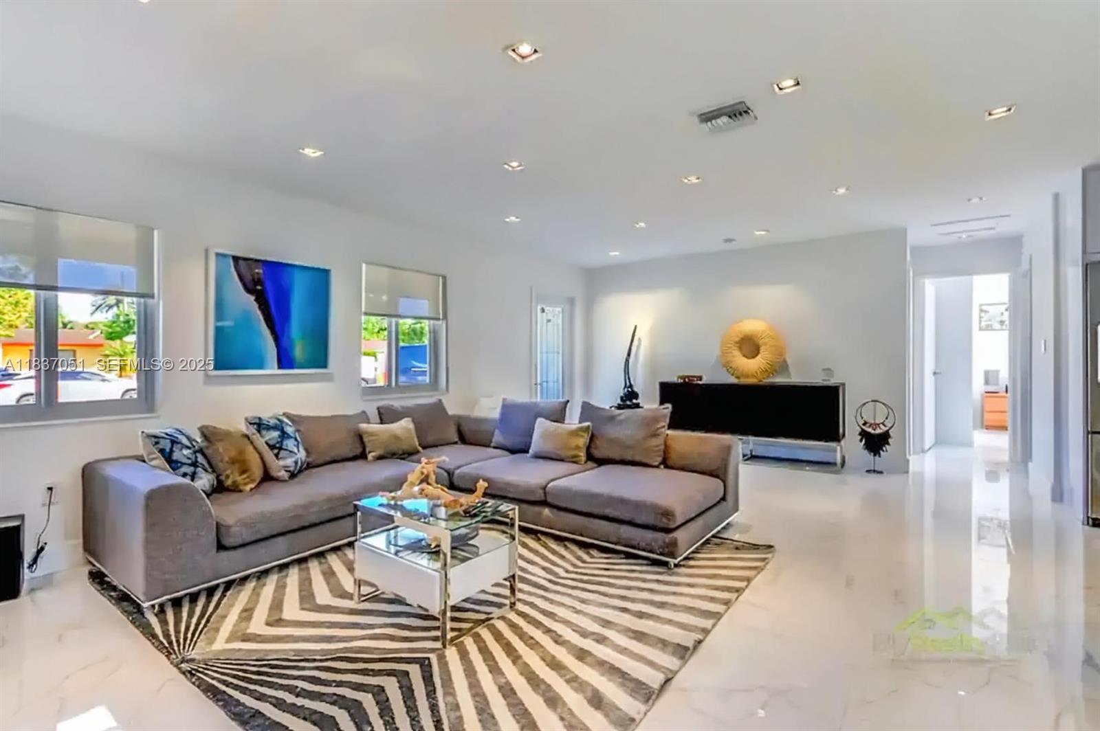 10010 Southwest 162nd Street Miami, FL 33157 - Photo 8 of 22 a living room with furniture and a couch