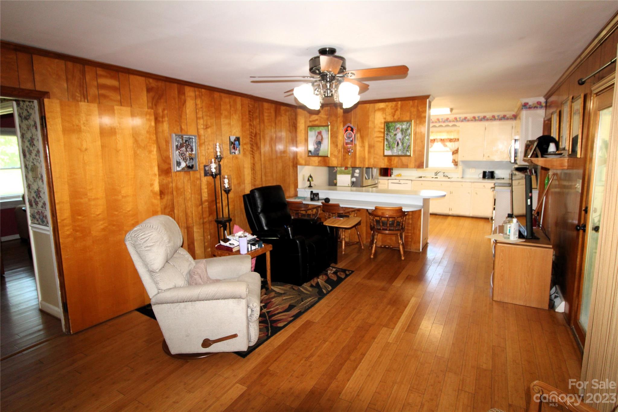 854 Wilmoth Road Clover, SC 29710 - Photo 11 of 33 a view of a dining room with furniture window and wooden floor