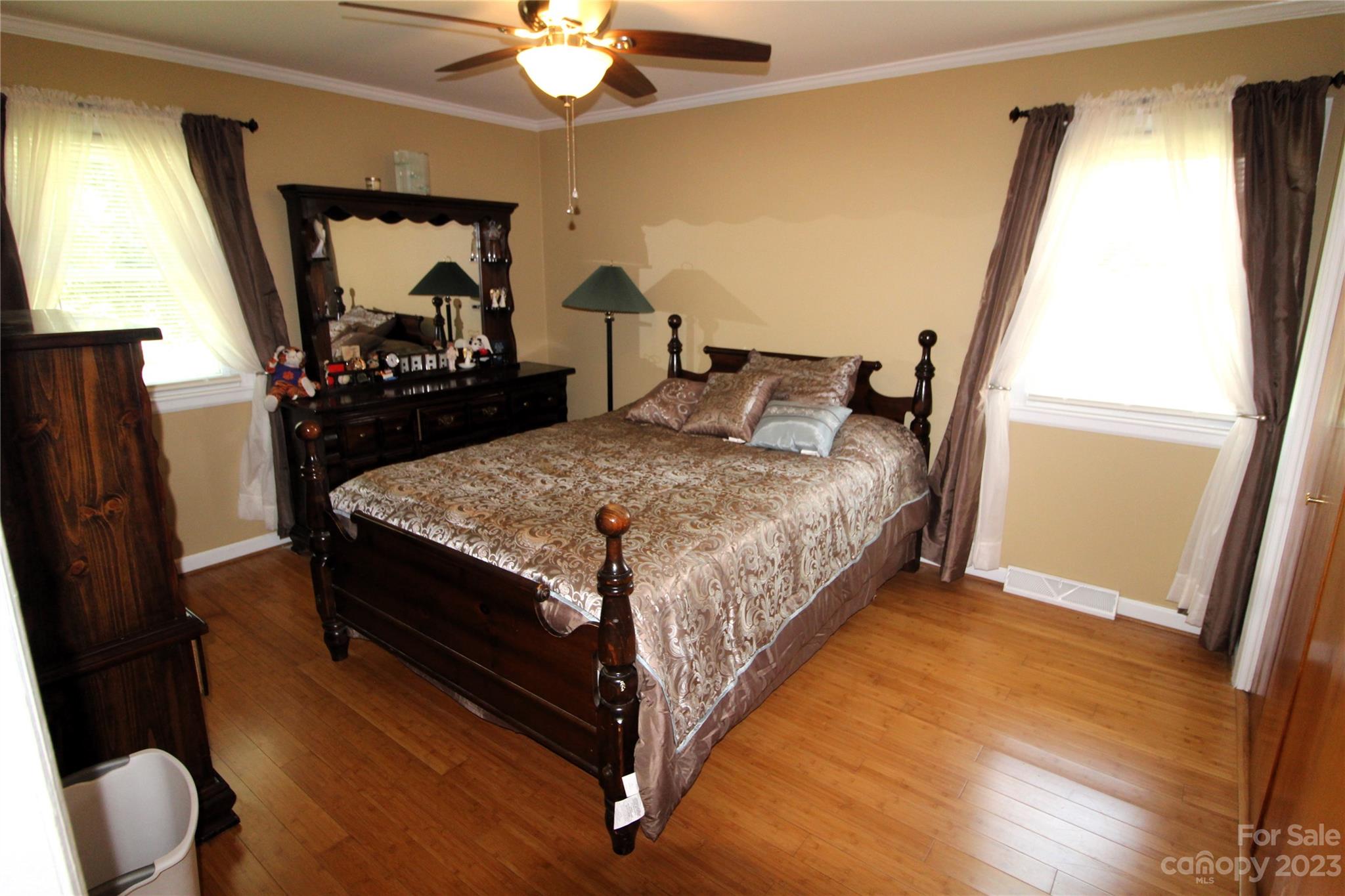 854 Wilmoth Road Clover, SC 29710 - Photo 16 of 33 a bed sitting in a bedroom next to a window