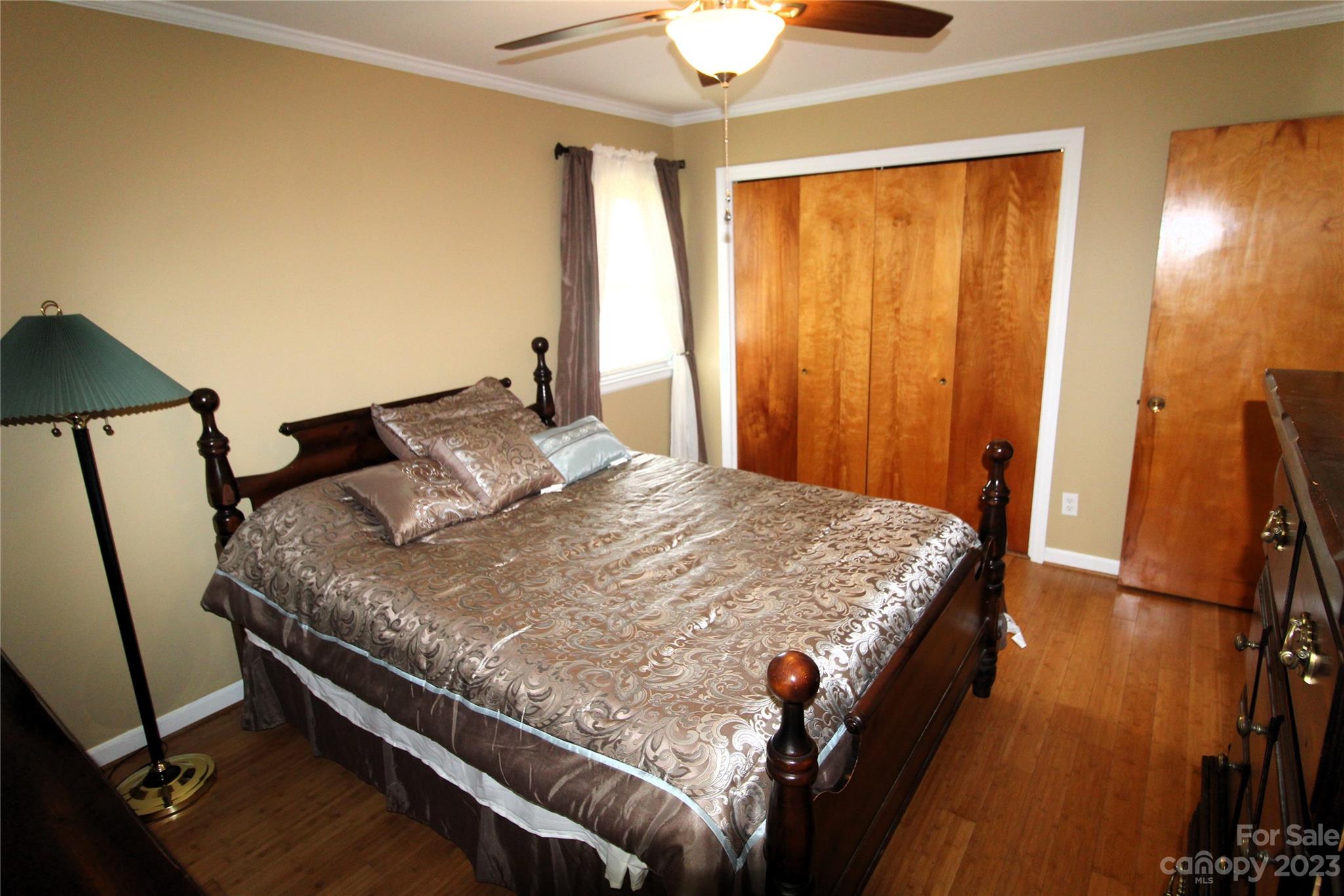 854 Wilmoth Road Clover, SC 29710 - Photo 17 of 33 a bed sitting in a bedroom next to a window