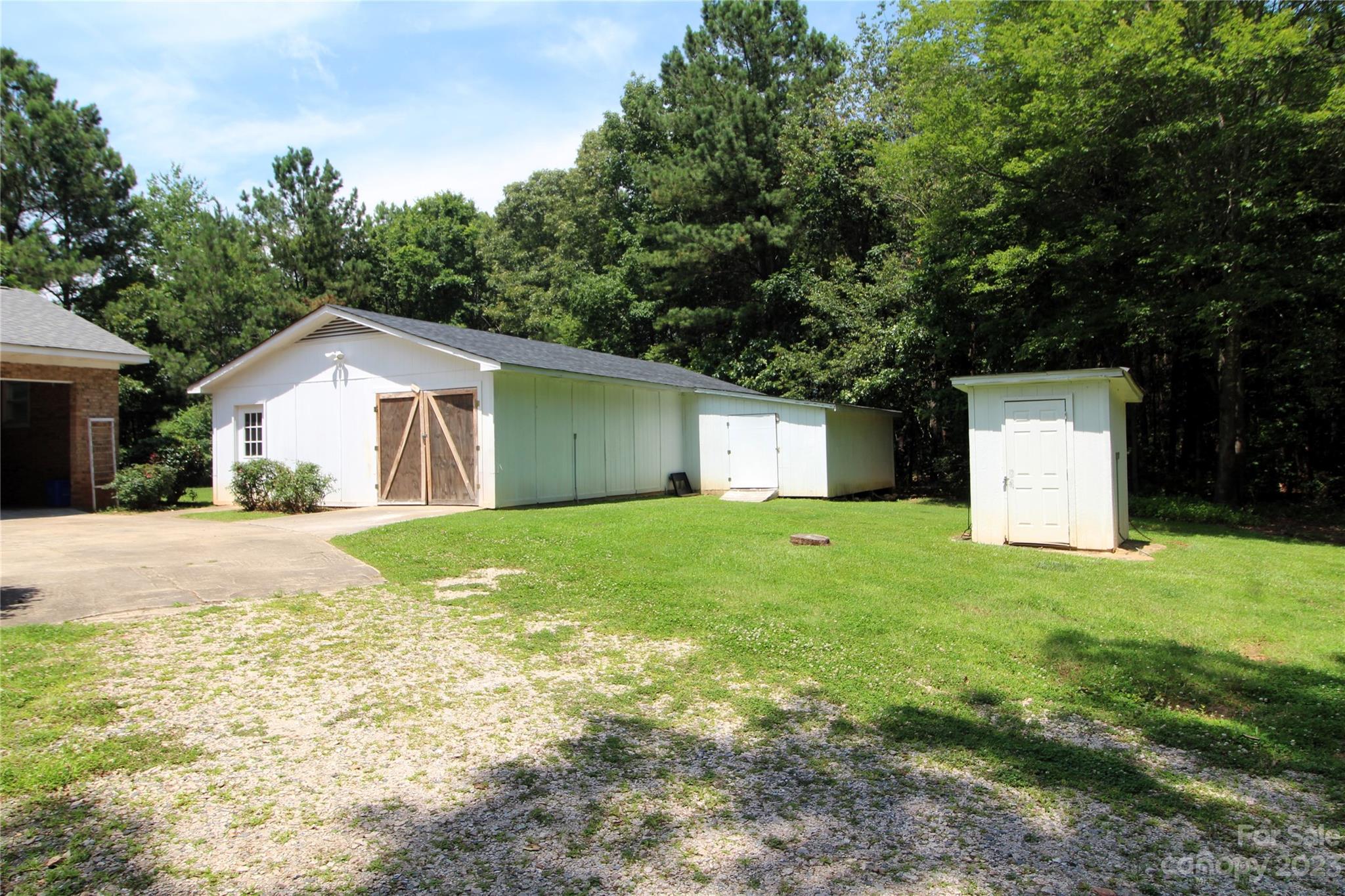 854 Wilmoth Road Clover, SC 29710 - Photo 31 of 33 a view of a house with a yard and tree