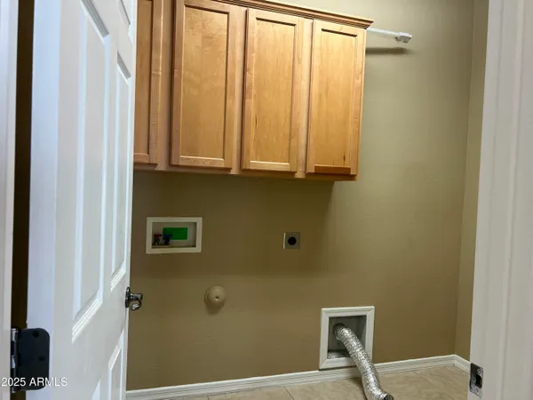 a bathroom with a sink toilet and a mirror