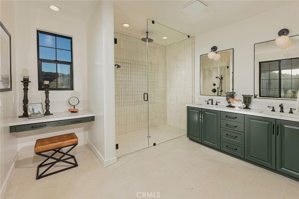 2975 Place De Mouton Bonsall, CA 92084 - Photo 7 of 13 a spacious bathroom with a shower sink mirror and
