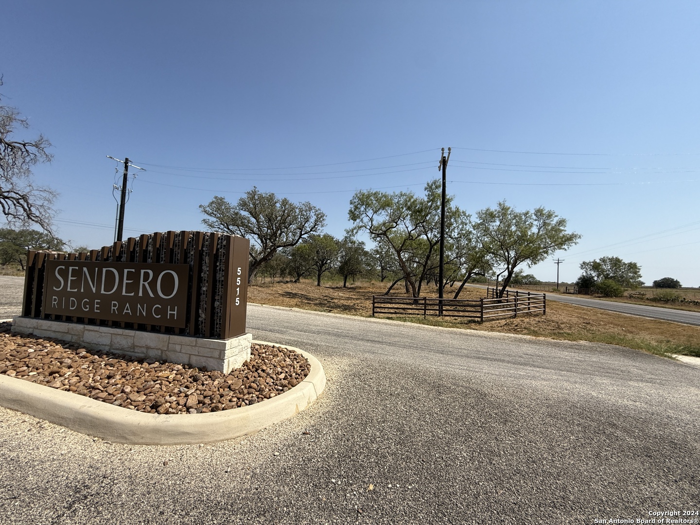 5515 Farm To Market 462 Devine, TX 78016 - Photo 17 of 27 a sign that is sitting on the side of a road