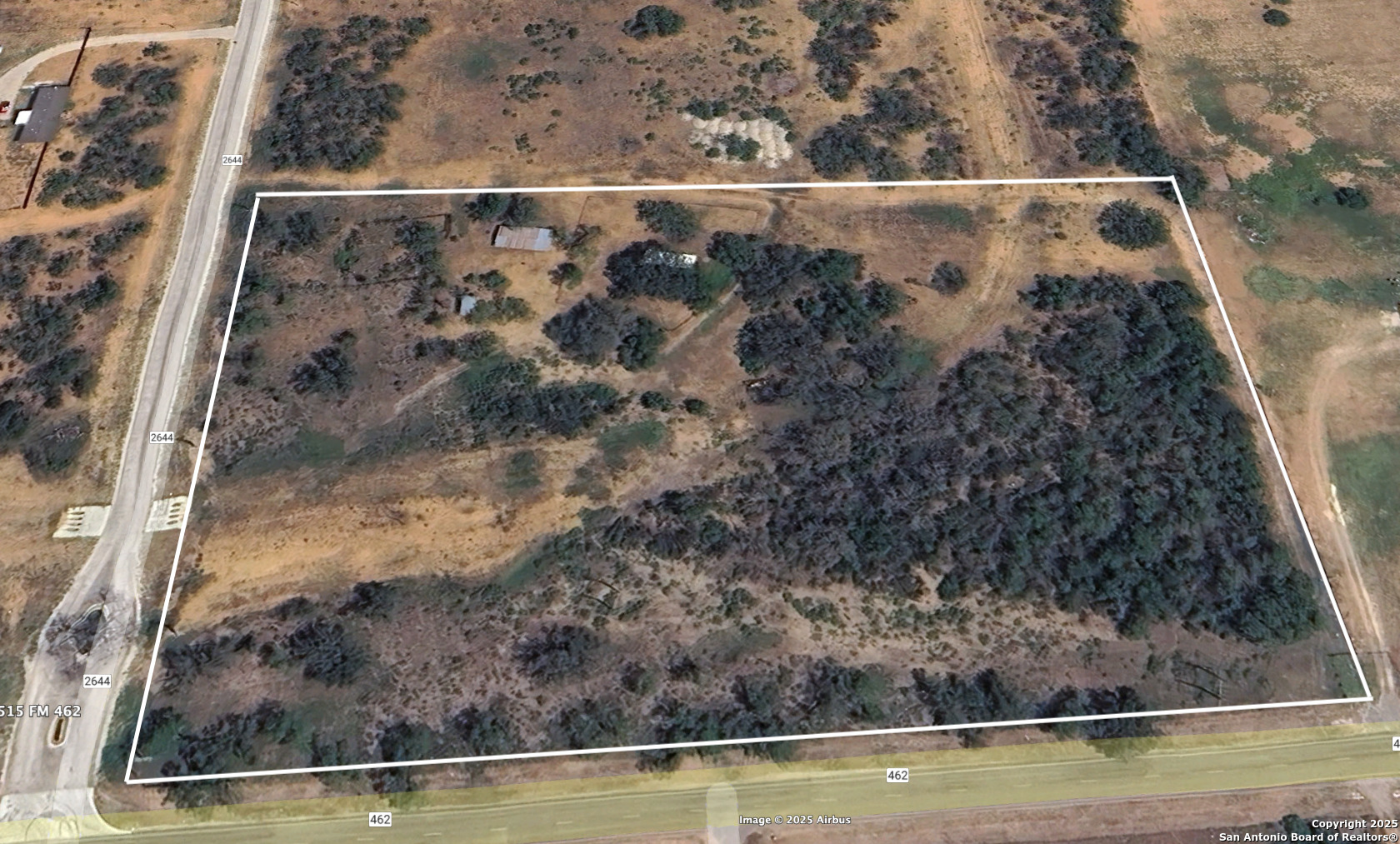 5515 Farm To Market 462 Devine, TX 78016 - Photo 2 of 27 a view of a wooden floor