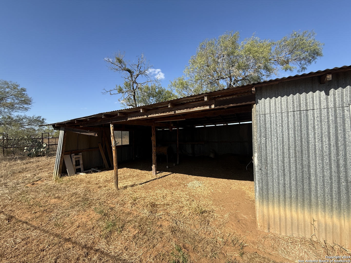 5515 Farm To Market 462 Devine, TX 78016 - Photo 26 of 27 a view of house with a outdoor space