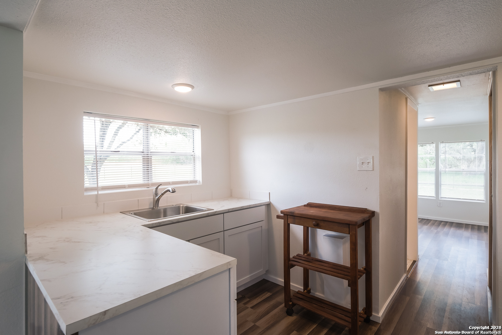 5515 Farm To Market 462 Devine, TX 78016 - Photo 10 of 27 a kitchen with furniture and window