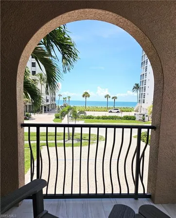 a view of balcony with wooden floor
