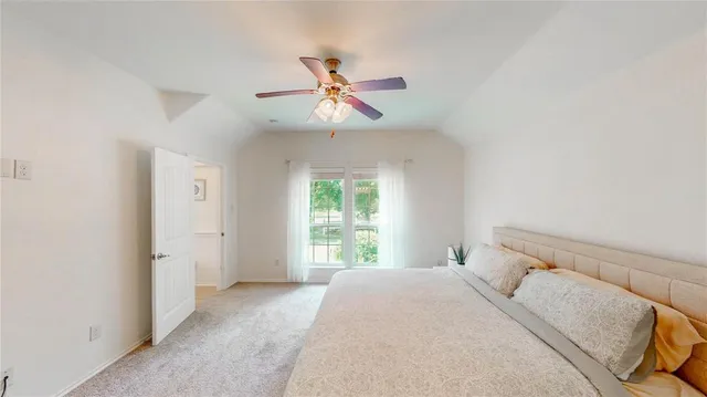 a view of hall way with mirror