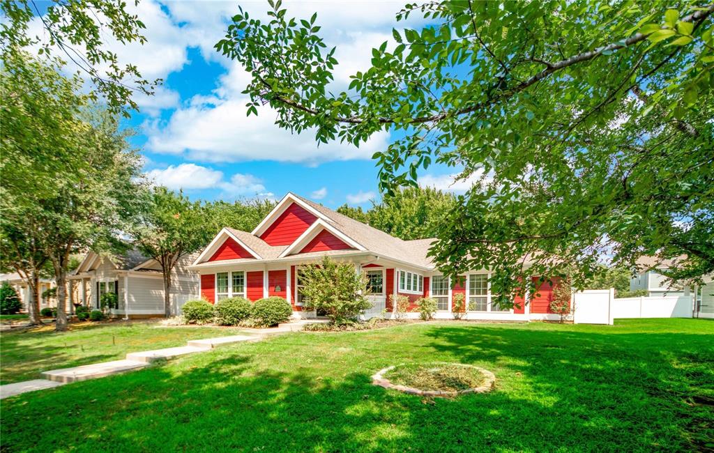 1808 Dr Sanders Road Providence Village, TX 76227 - Photo 2 of 31 a front view of a house with a yard