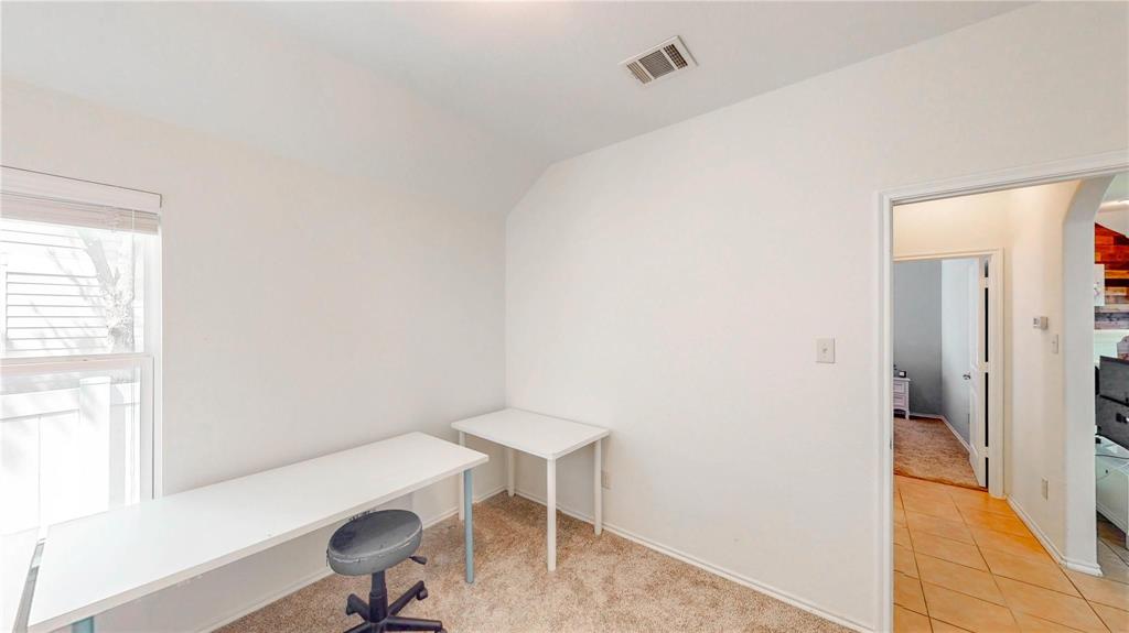 1808 Dr Sanders Road Providence Village, TX 76227 - Photo 23 of 31 a view of room with a window and a chair