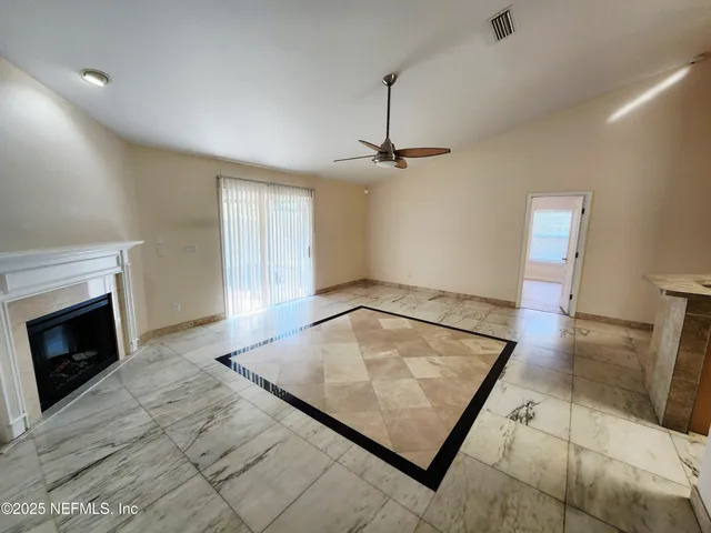a bathroom with a bathtub and a sink