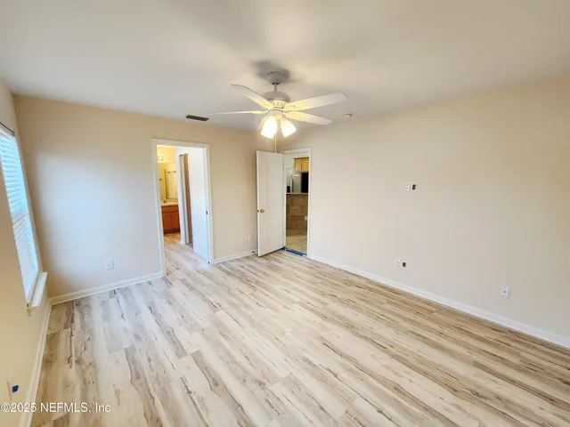 a bathroom with a bathtub and a sink