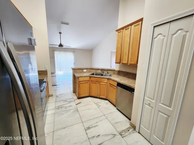 a view of a livingroom with a fireplace and a fireplace