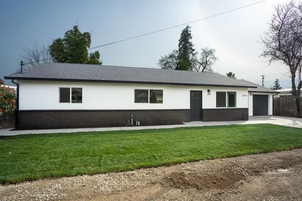 front view of a house and a yard