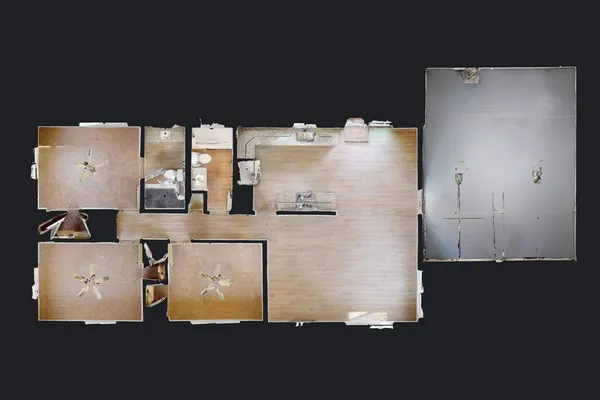 an aerial view of residential houses with outdoor space