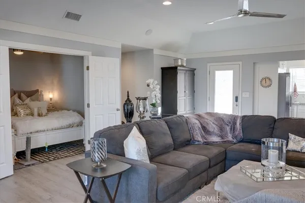 a kitchen with stainless steel appliances granite countertop a sink a stove and cabinets