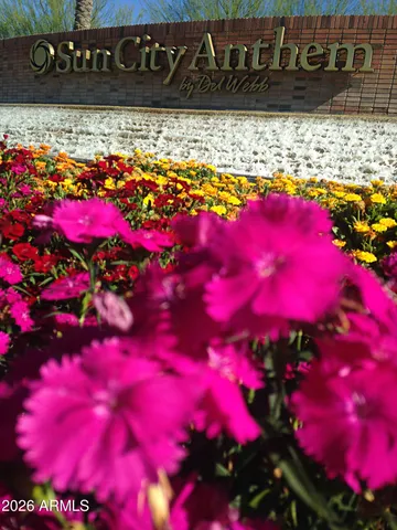 an aerial view of a house with a yard basket ball court and outdoor seating