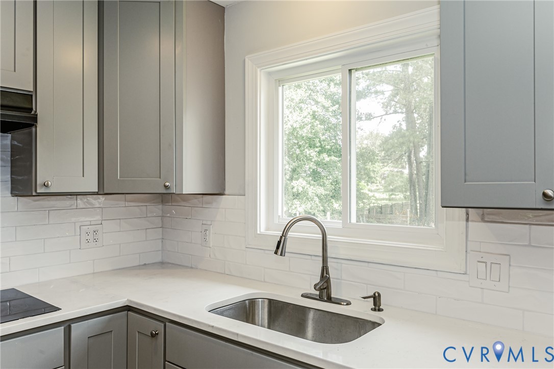 2015 Fordson Road Richmond, VA 23229 - Photo 13 of 48 Kitchen featuring a stainless steel sink, brushed