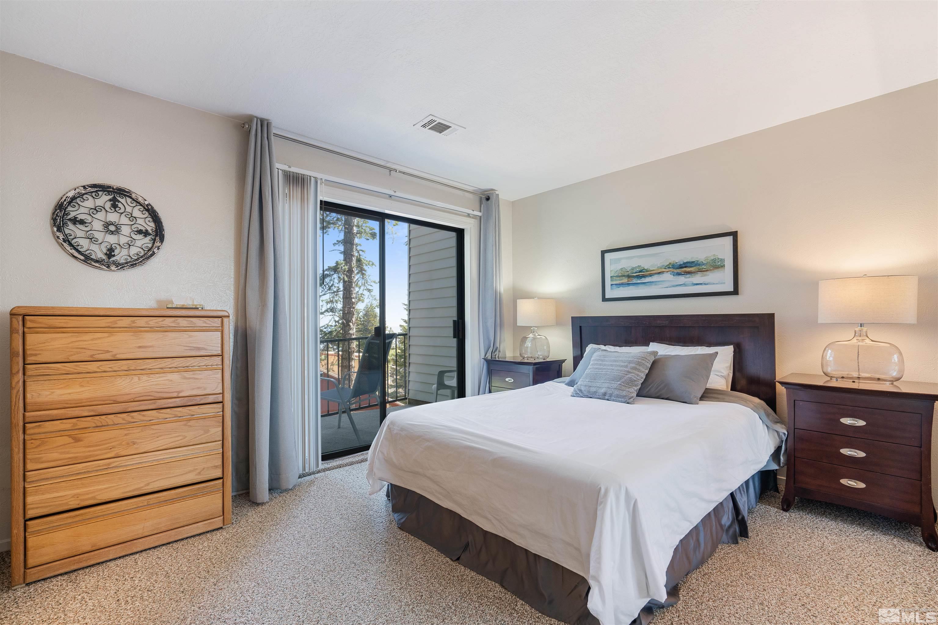 754 Boulder Court, Unit 9 Stateline, NV 89449 - Photo 17 of 38 a bedroom with a bed and a closet