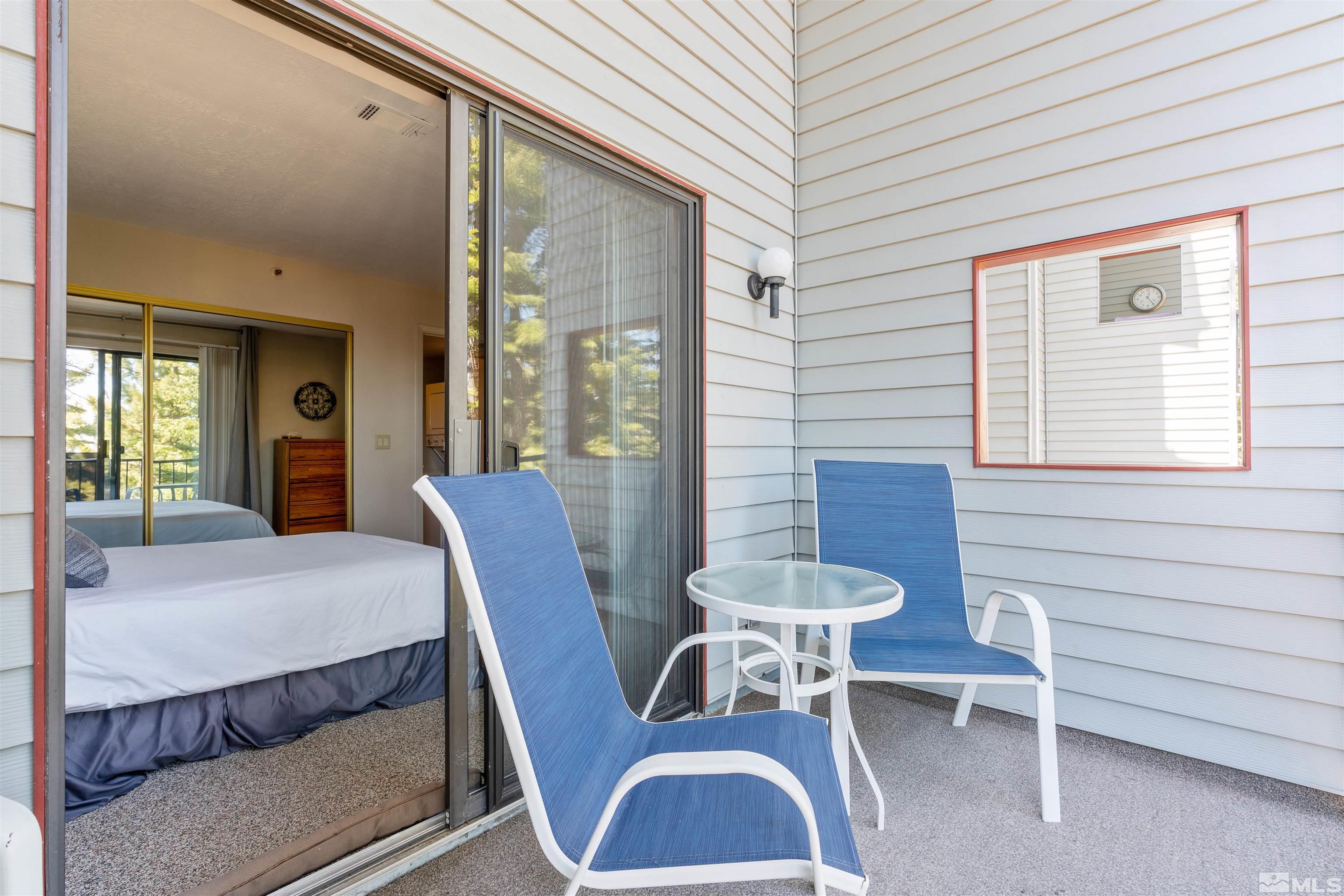 754 Boulder Court, Unit 9 Stateline, NV 89449 - Photo 19 of 38 a view of a dining room with furniture and wooden floor