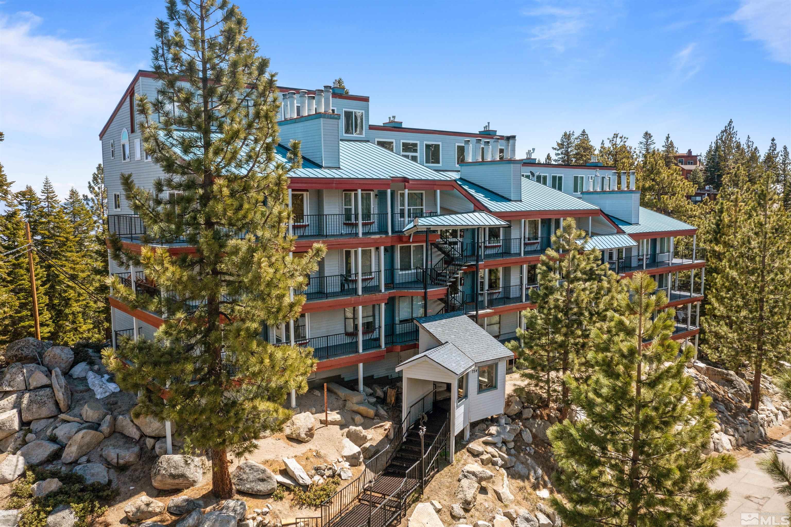 754 Boulder Court, Unit 9 Stateline, NV 89449 - Photo 38 of 38 a aerial view of a house with swimming pool and sitting area