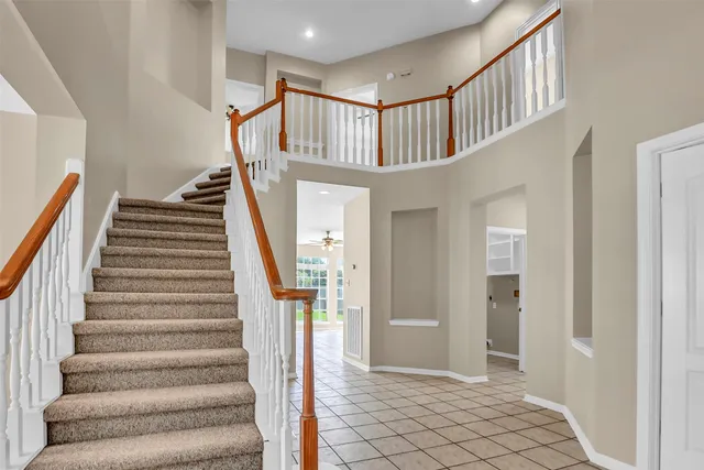 a en suite bathroom with a sink a toilet and shower
