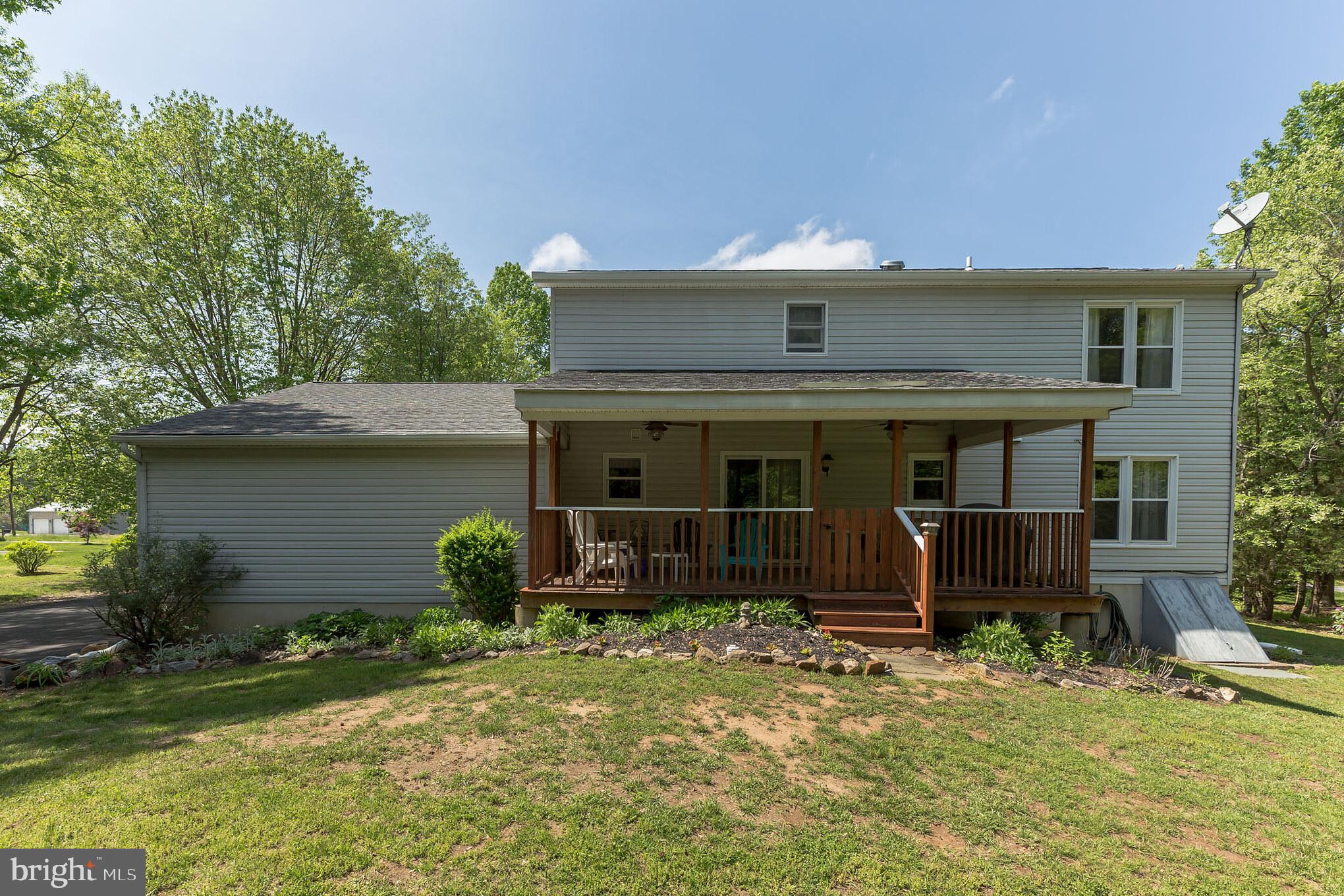 318 Moods Road Monroeville, NJ 08343 - Photo 10 of 36 Rear Covered Deck with 2 Ceiling Fans