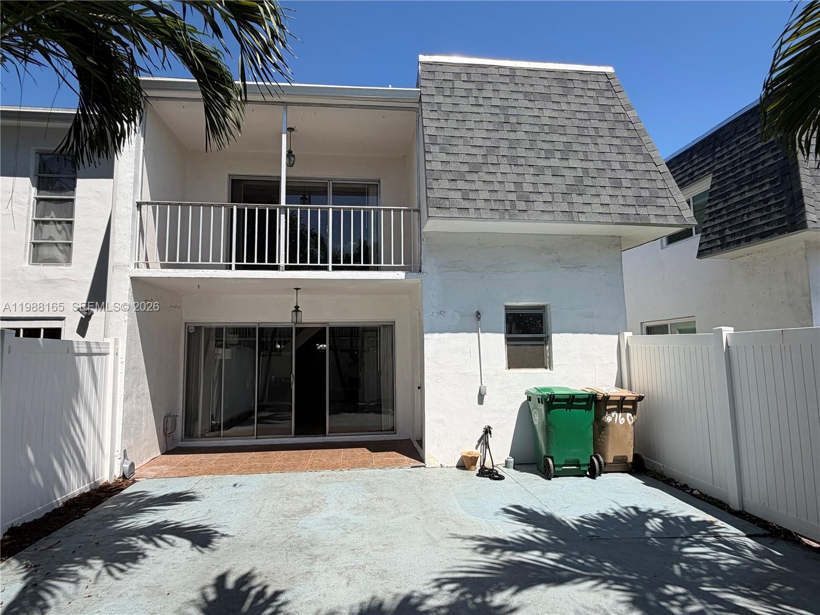 6760 Southwest 40th Street, Unit 41 Davie, FL 33314 - Photo 19 of 51 a view of a brick house with many windows