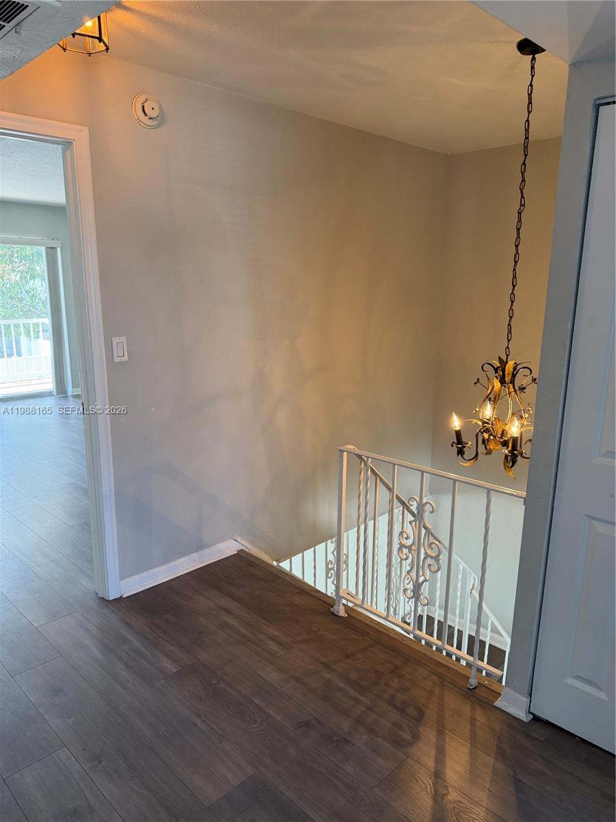 6760 Southwest 40th Street, Unit 41 Davie, FL 33314 - Photo 27 of 51 a view of entryway with wooden floor