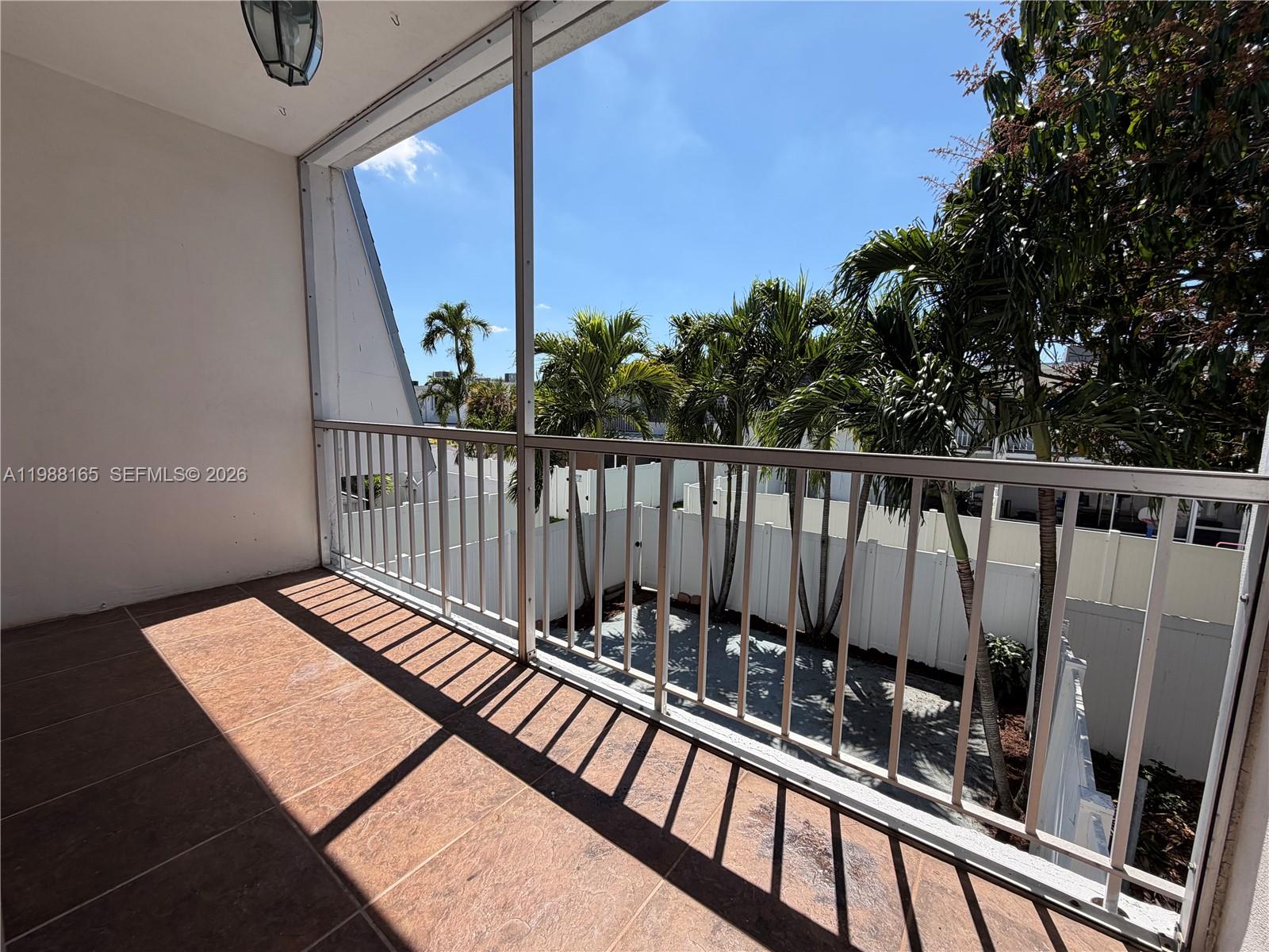 6760 Southwest 40th Street, Unit 41 Davie, FL 33314 - Photo 31 of 51 a view of balcony with wooden floor