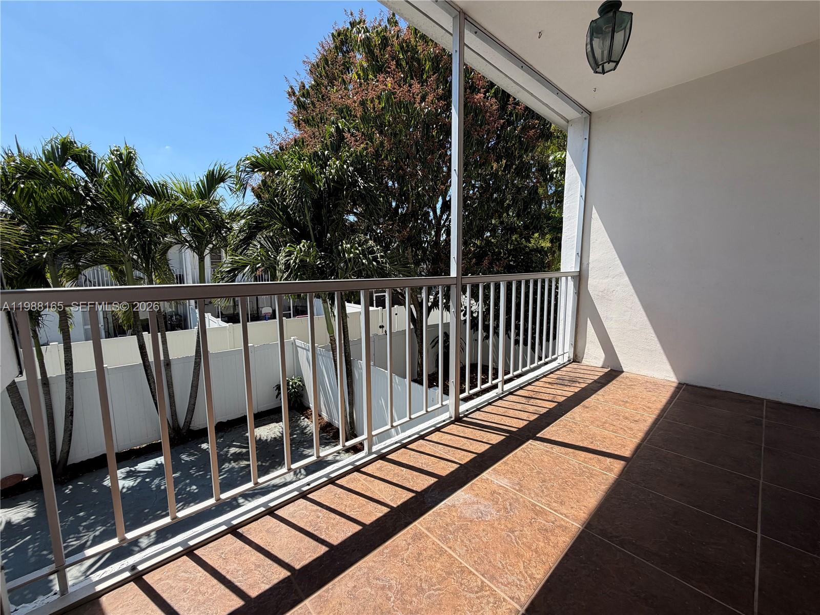 6760 Southwest 40th Street, Unit 41 Davie, FL 33314 - Photo 32 of 51 a view of balcony with wooden floor