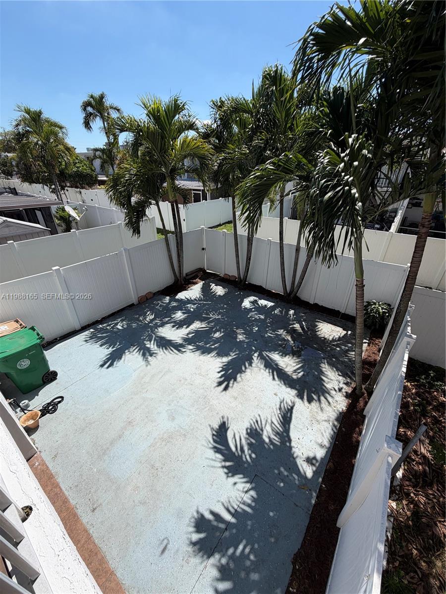 6760 Southwest 40th Street, Unit 41 Davie, FL 33314 - Photo 34 of 51 a view of a backyard of a house