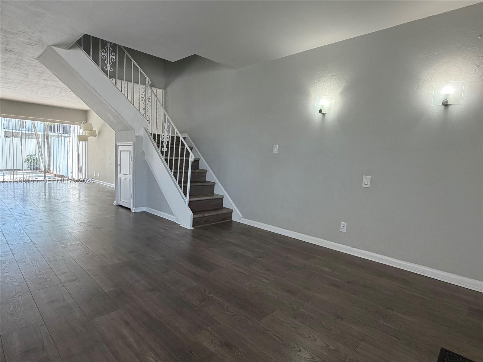 6760 Southwest 40th Street, Unit 41 Davie, FL 33314 - Photo 7 of 51 a view of an entryway with wooden floor