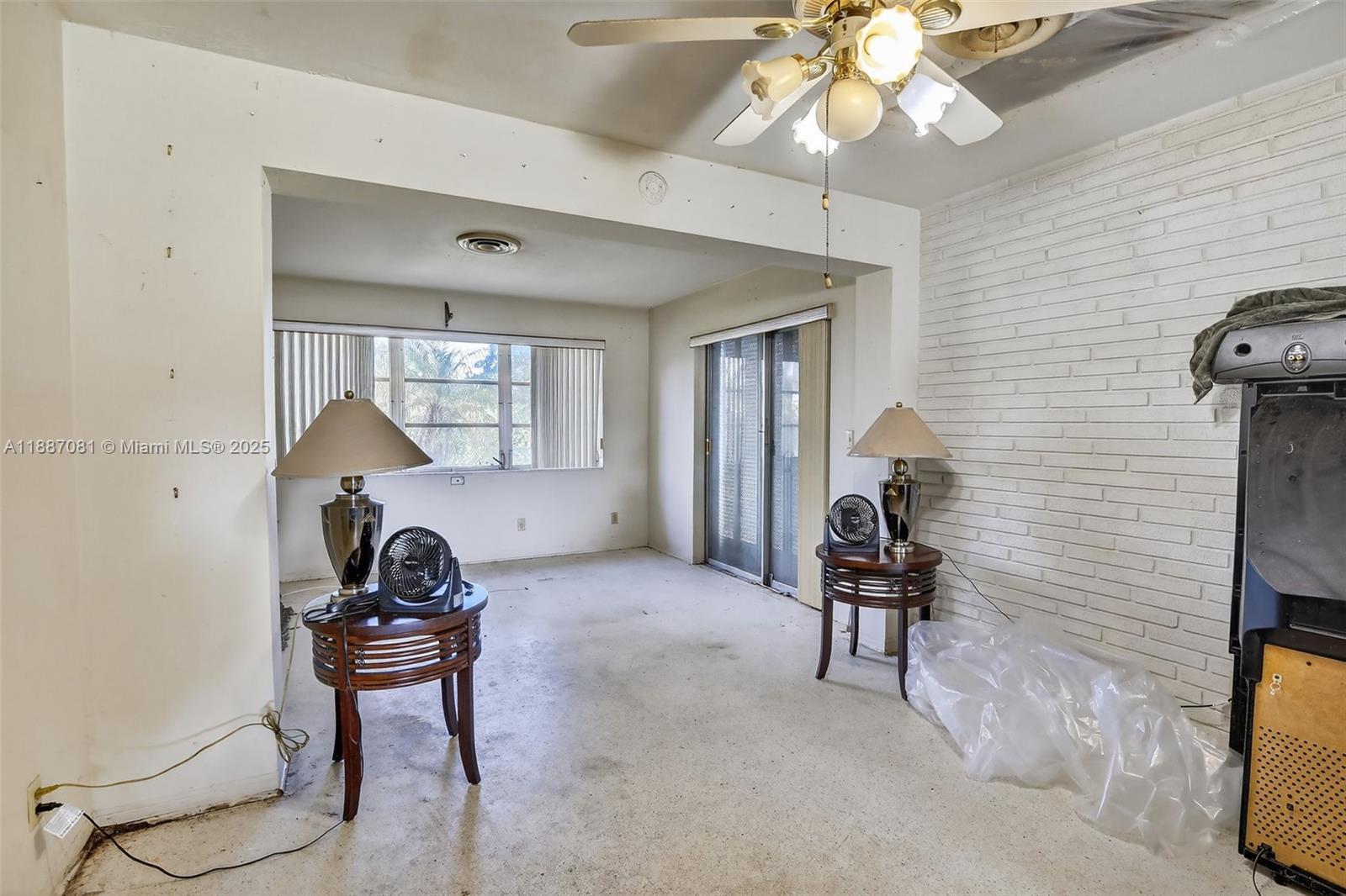 4315 West Park Road Hollywood, FL 33021 - Photo 5 of 24 a view of a livingroom with furniture and a window