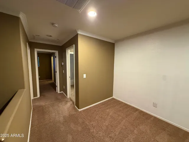 a view of hallway with closet
