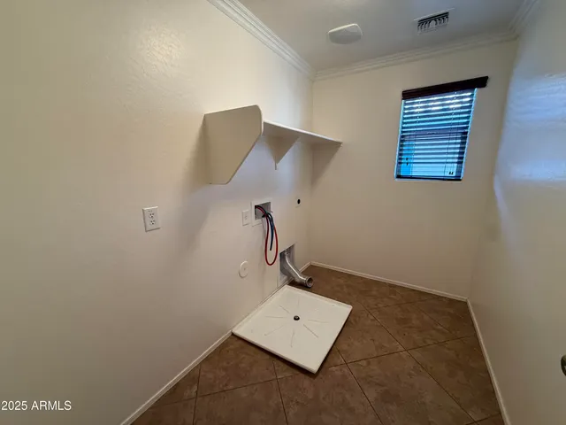 a view of an empty room with windows