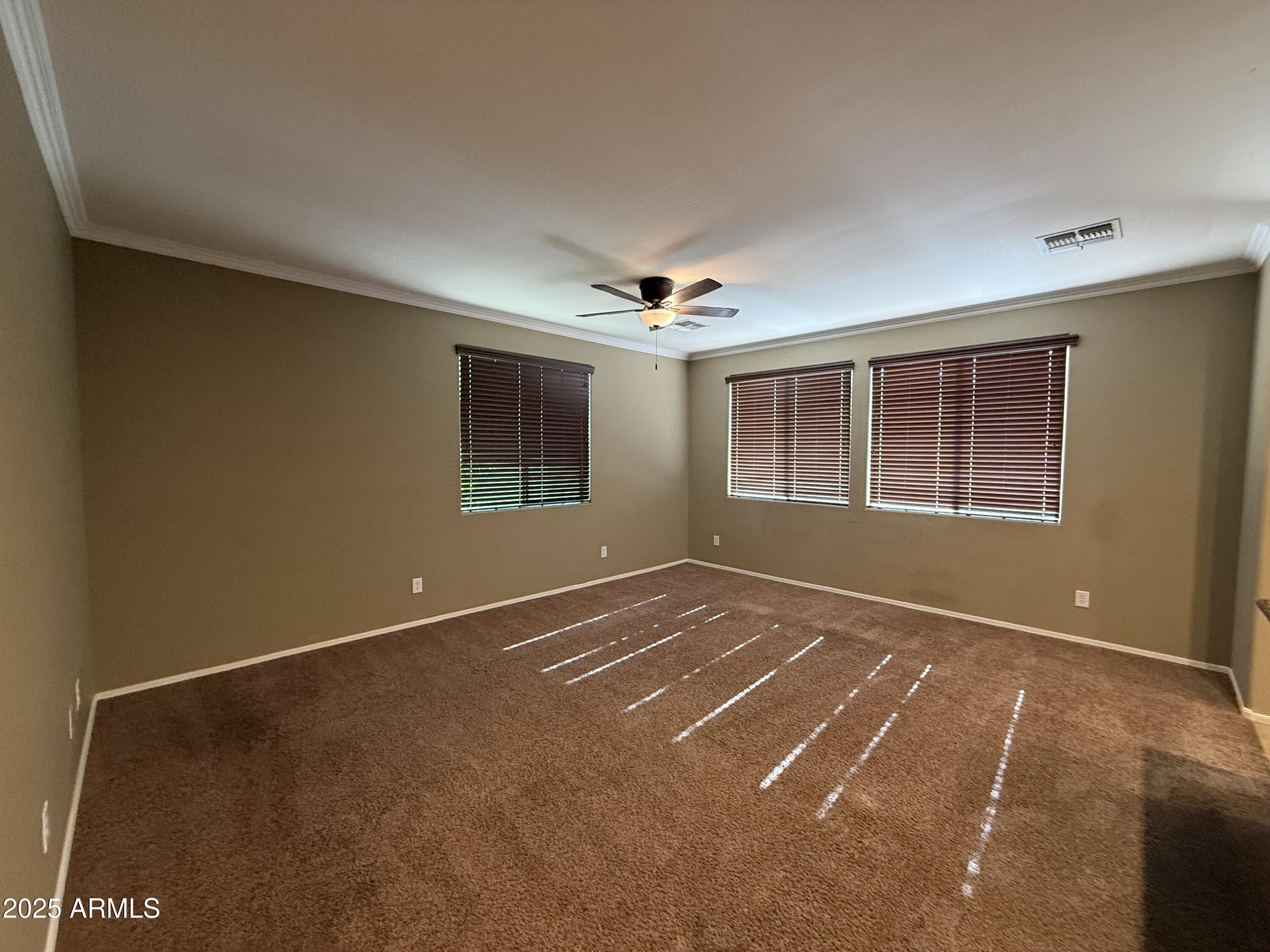 3511 East Tulsa Street Gilbert, AZ 85295 - Photo 7 of 30 a view of an empty room with a window