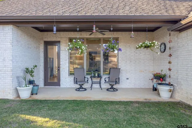 a view of two chairs in patio