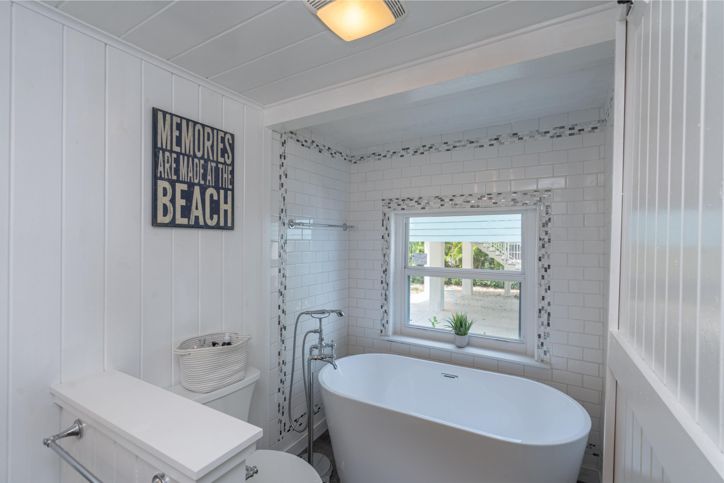 124 South Bay Harbor Drive Key Largo, FL 33037 - Photo 16 of 28 a bathroom with a sink and a bathtub