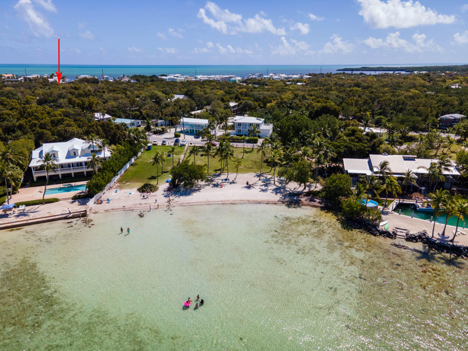 124 South Bay Harbor Drive Key Largo, FL 33037 - Photo 4 of 28 a view of a houses with sky view