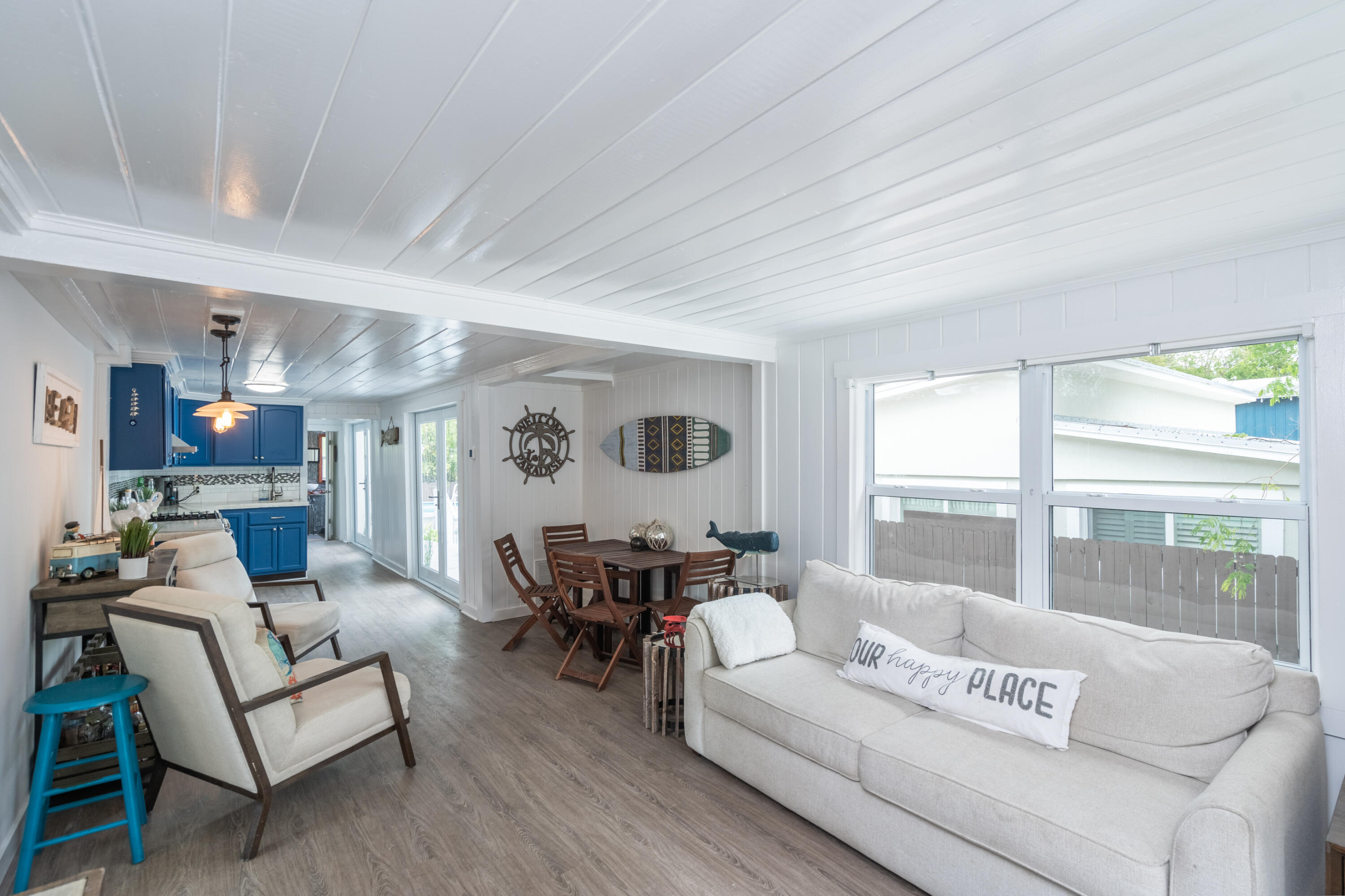 124 South Bay Harbor Drive Key Largo, FL 33037 - Photo 10 of 28 a living room with furniture and a large window