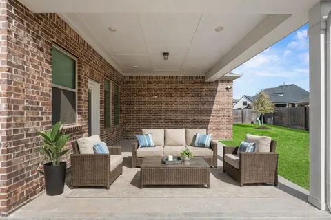 a outdoor living space with furniture and garden