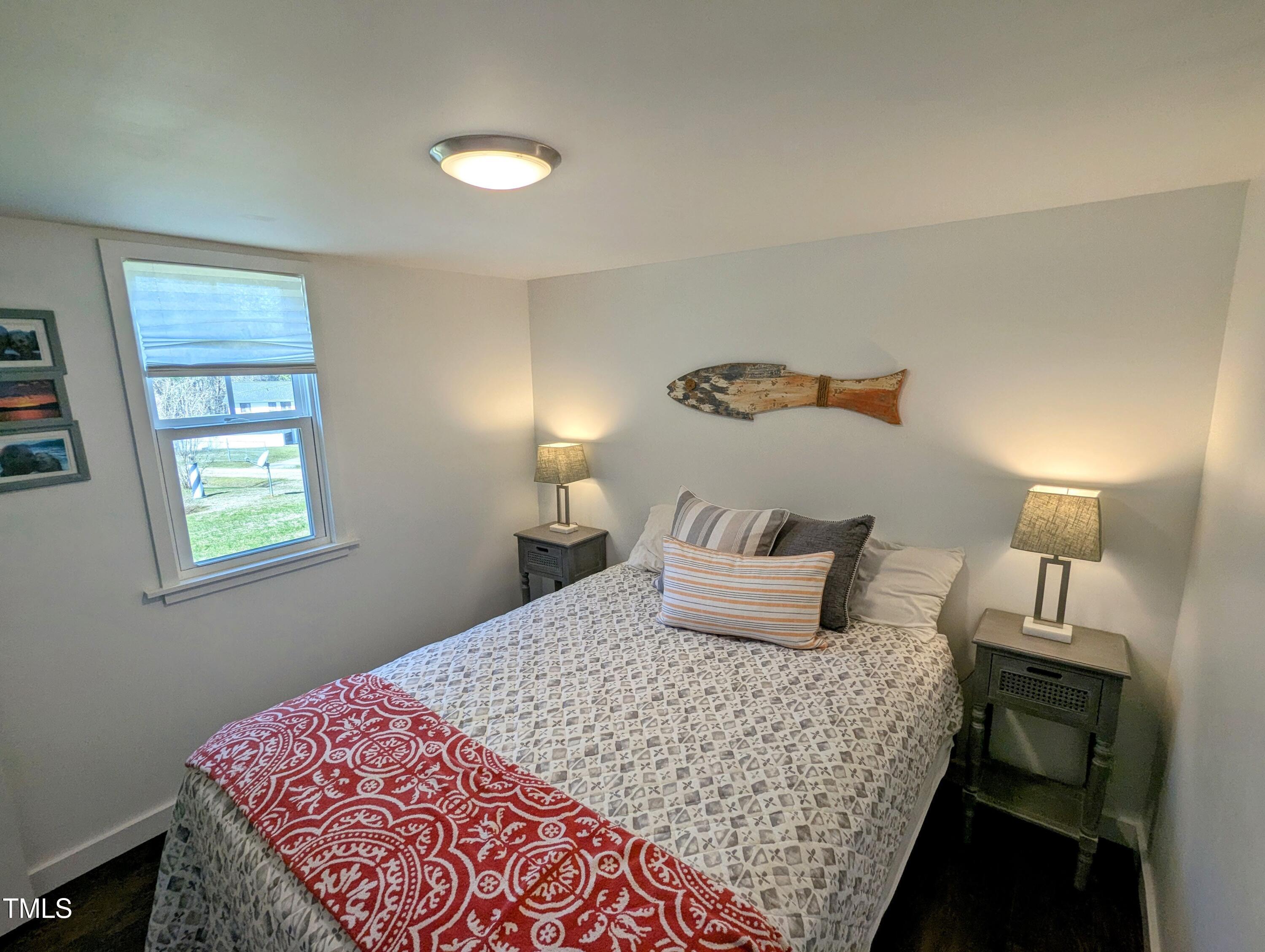 529 Flanagan Road Henderson, NC 27537 - Photo 20 of 38 a bedroom with a bed and window