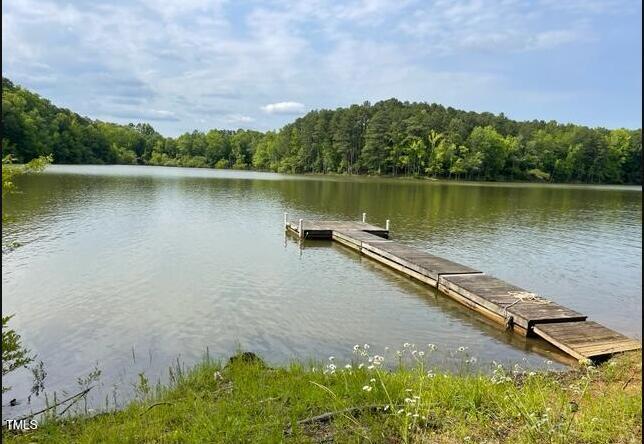 529 Flanagan Road Henderson, NC 27537 - Photo 29 of 38 an aerial view of a house with a lake view