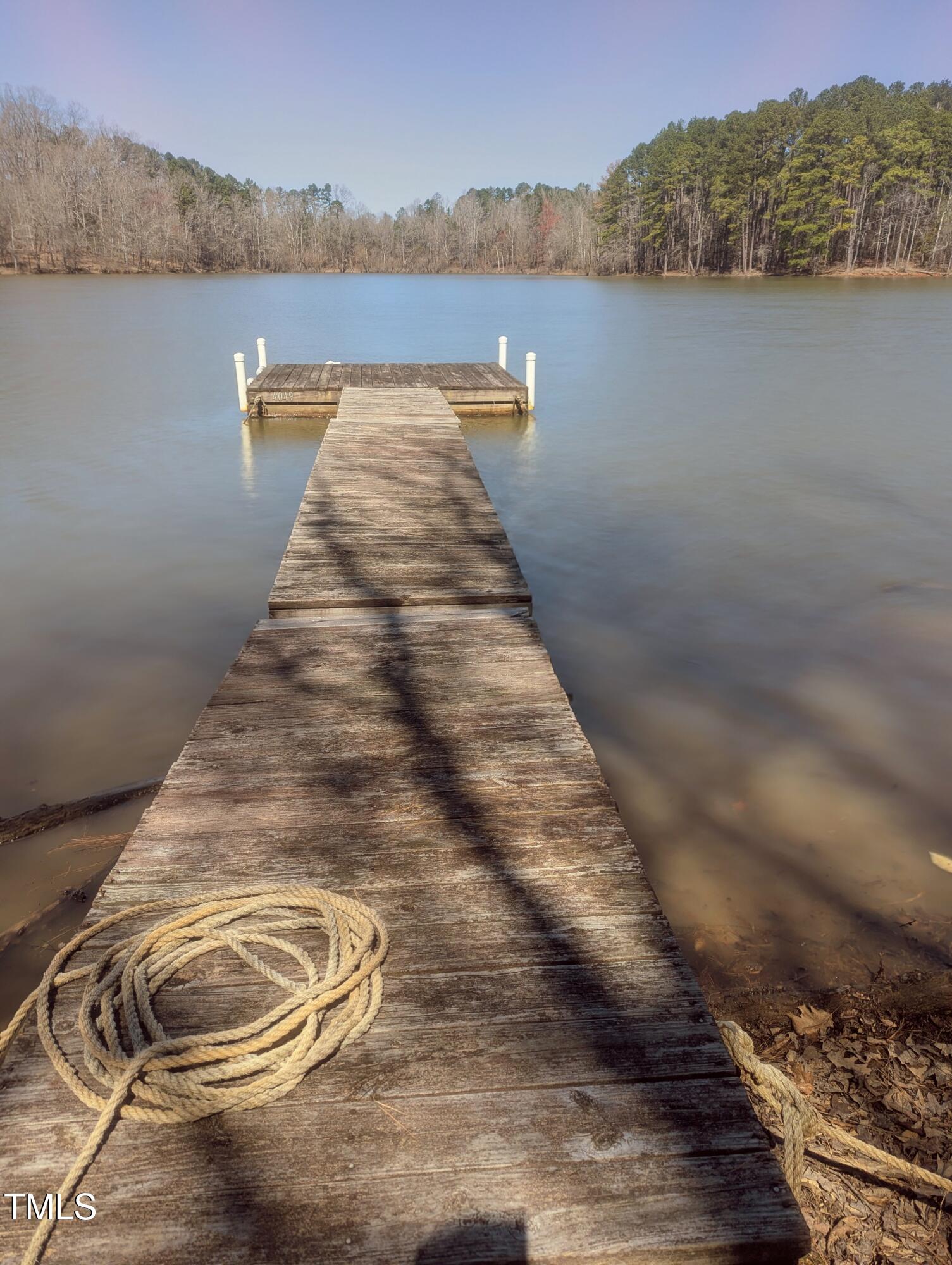 529 Flanagan Road Henderson, NC 27537 - Photo 30 of 38 a view of a lake from a balcony