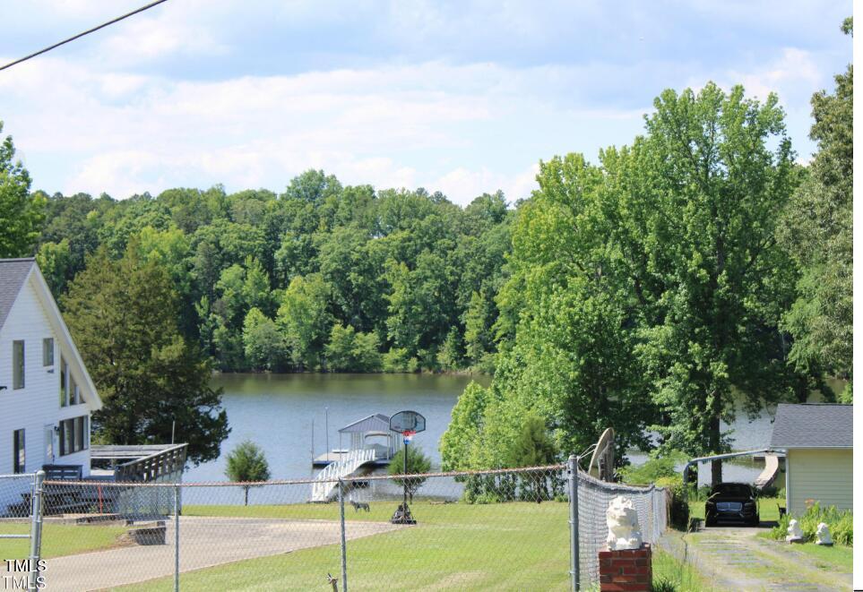 529 Flanagan Road Henderson, NC 27537 - Photo 5 of 38 a view of a swimming pool with a patio