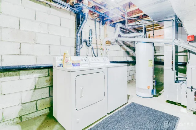 a utility room with cabinets