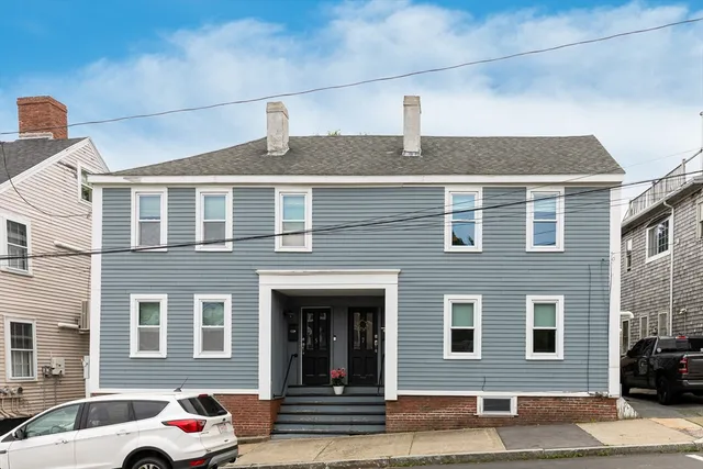 an aerial view of a swimming pool with outdoor space